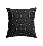 Peony Paradise Indoor Pillow elegantly placed on a living room couch.